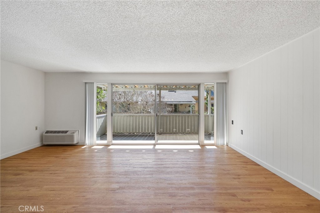 Vinyl flooring with extra wide balcony sliding glass doors - 225 Avenida Majorca N, Laguna Woods CA 92637 - photo 3