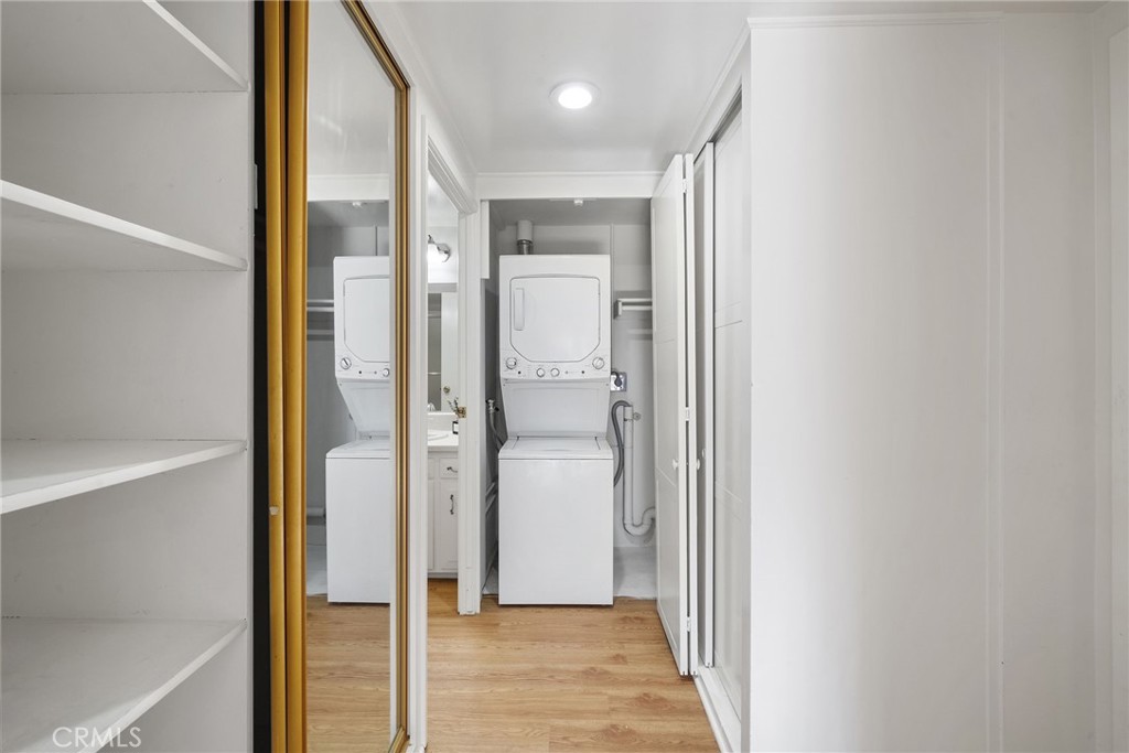There are storage closets and a private in-unit stacked washer and dryer in the hall between the two bedrooms - 225 Avenida Majorca N, Laguna Woods CA 92637 - photo 12