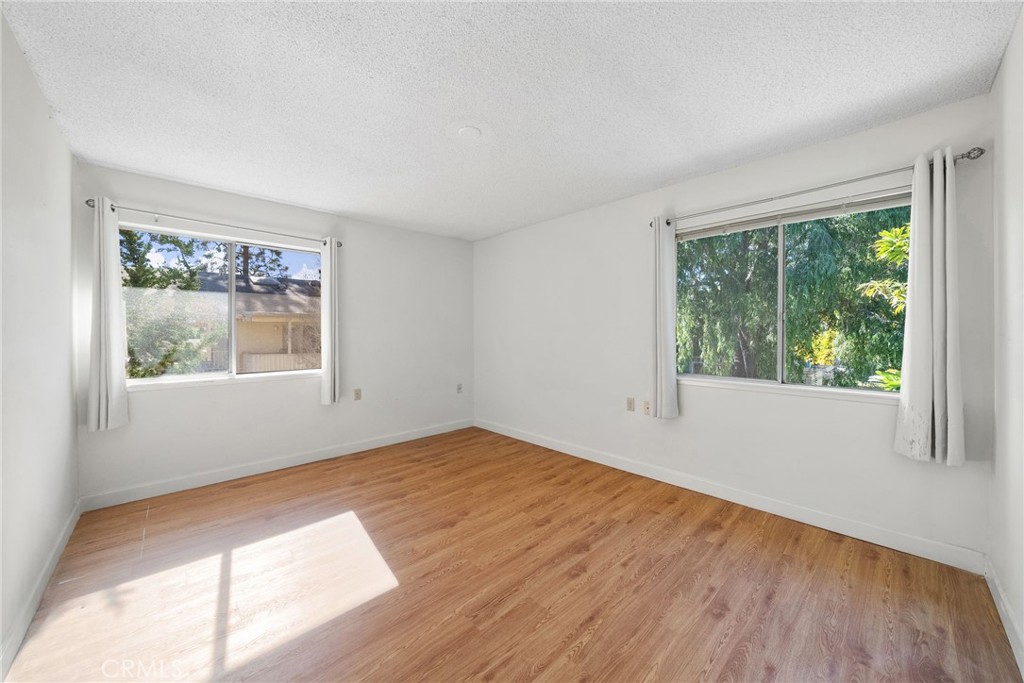 POV: Primary bedroom from the hallway - 225 Avenida Majorca N, Laguna Woods CA 92637 - photo 13