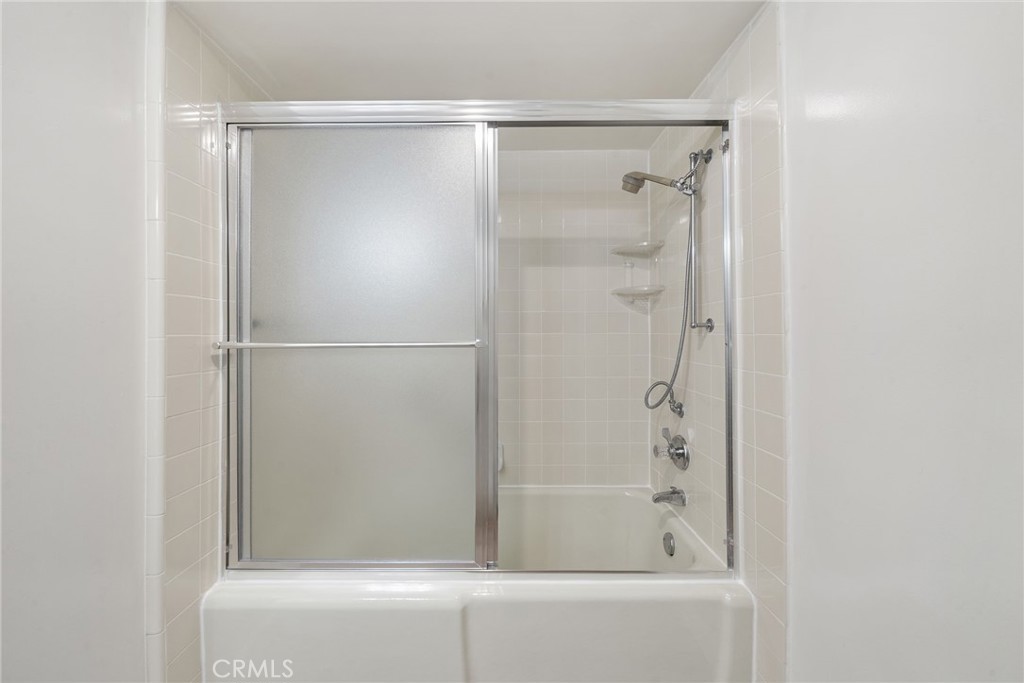 Primary en-suite offers a bathtub with a shower surround. - 225 Avenida Majorca N, Laguna Woods CA 92637 - photo 16