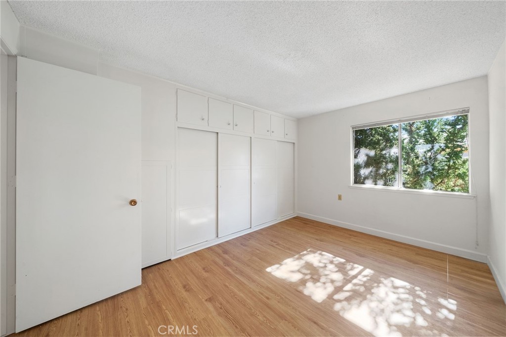 The second bedroom has ample closet space and great natural lighting - 225 Avenida Majorca N, Laguna Woods CA 92637 - photo 17