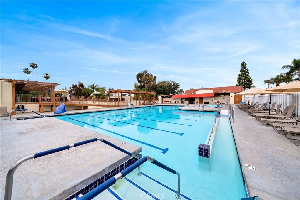 Clubhouse 4’s Olympic-size swimming pool, one of five pools in the Village. This facility also offers a hot pool, locker - 225 Avenida Majorca N, Laguna Woods CA 92637 - photo 22