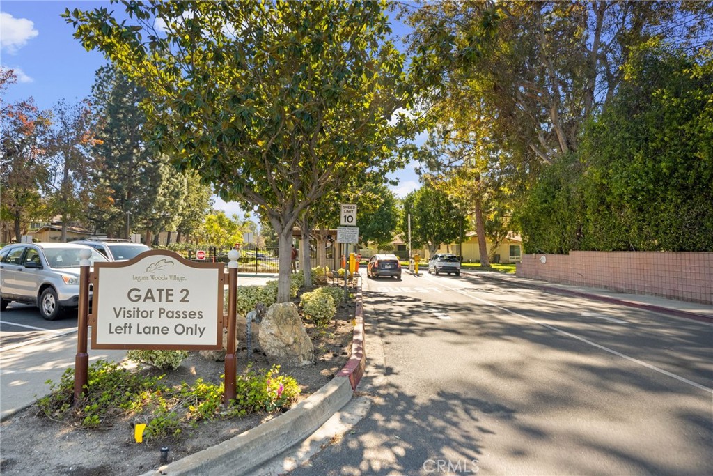 Gate 2, one of Laguna Woods Village’s 24-hour community entrances, with designated lanes for residents and guests. - 225 Avenida Majorca N, Laguna Woods CA 92637 - photo 27