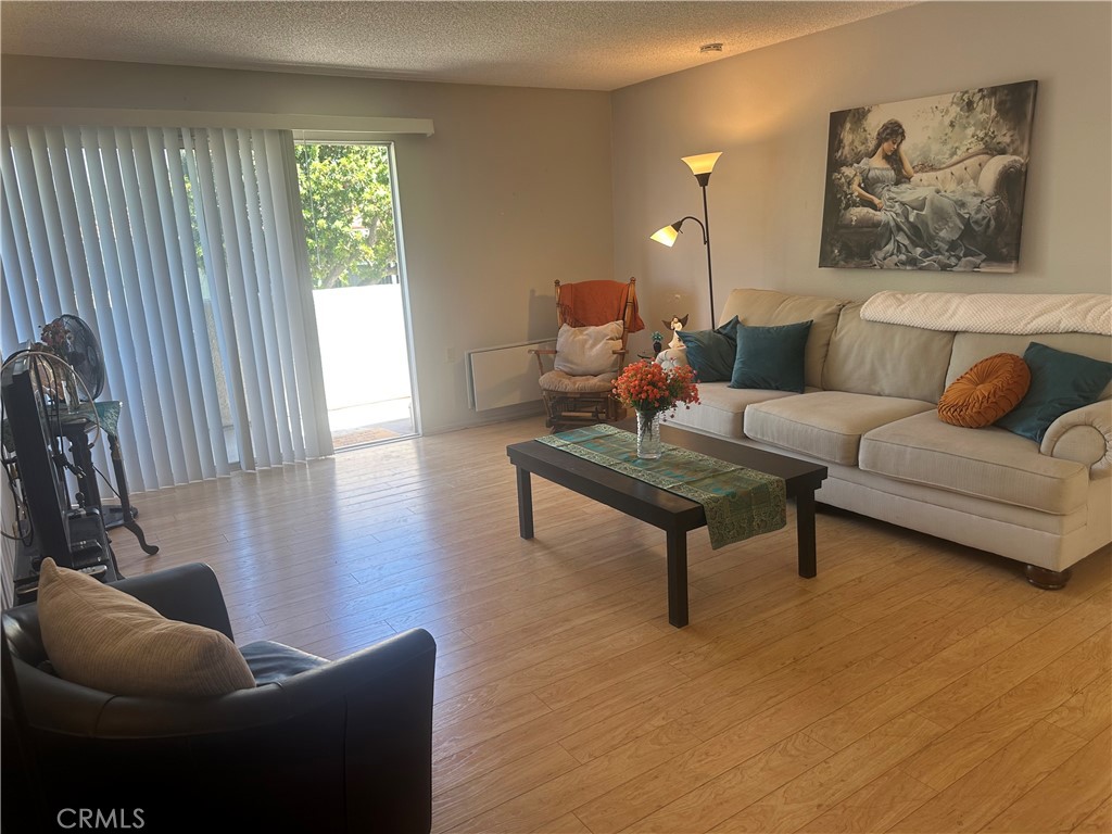 Living Room looking toward Balcony - 2267 Via Puerta, Laguna Woods CA 92637 - photo 1