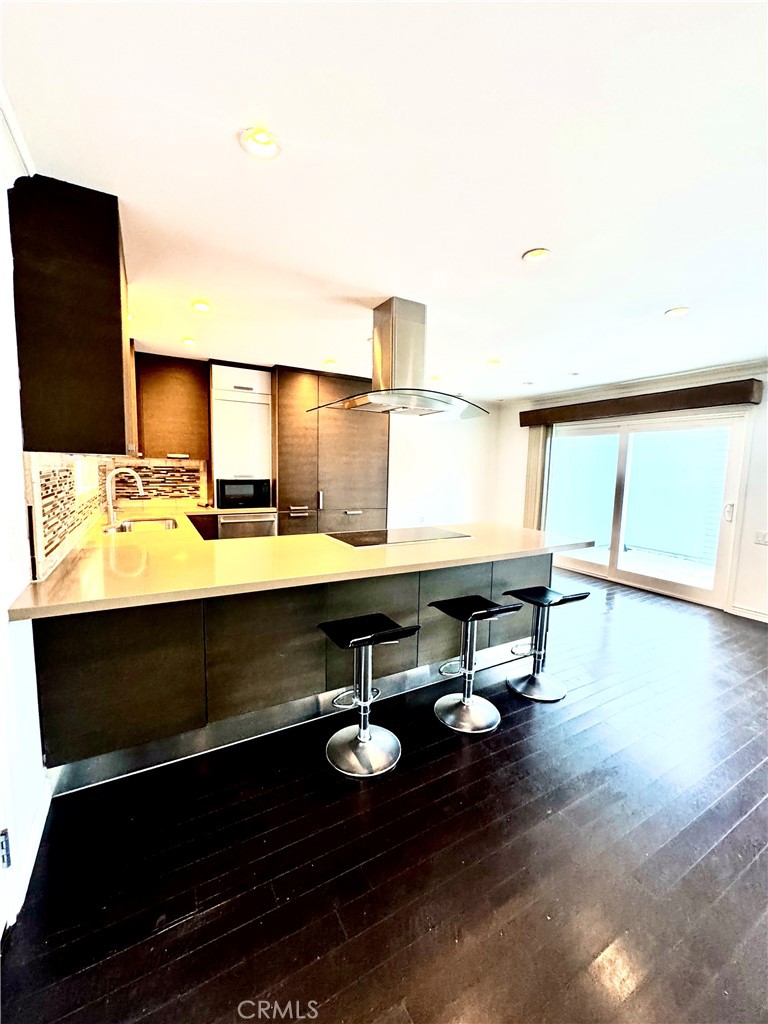 Living Room looking into kitchen - 2346 Via Mariposa W A, Laguna Woods CA 92637 - photo 2