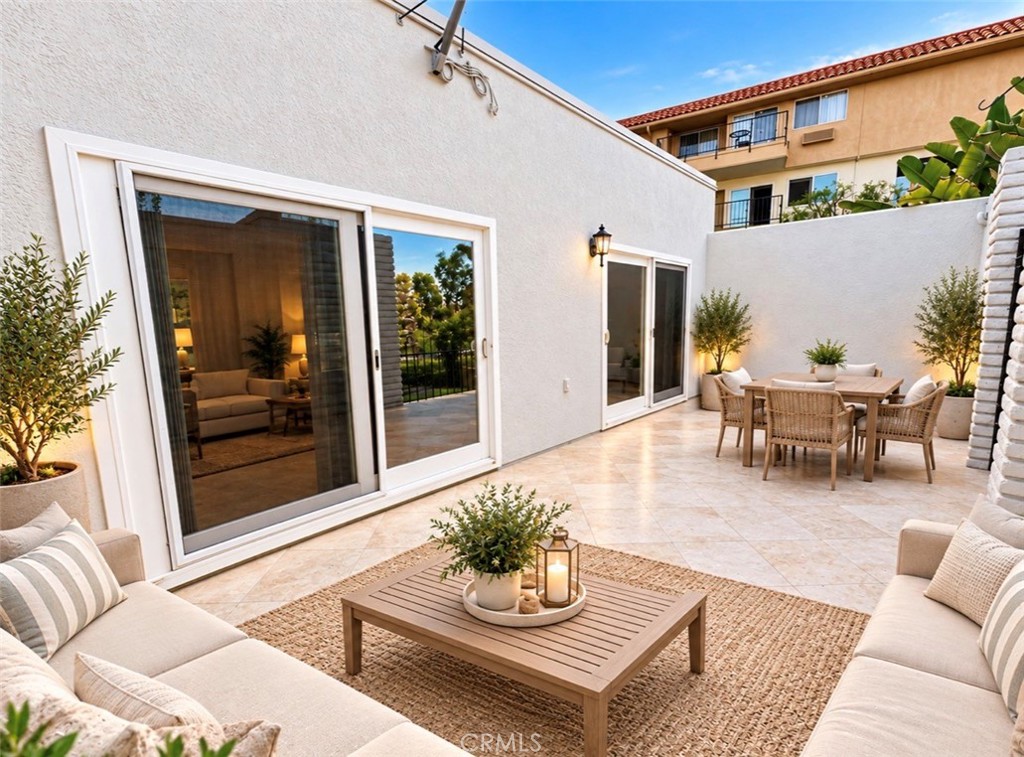 Step through the private gated entry, where travertine tile flooring sets an elegant tone from the moment you arrive (Vi - 2346 Via Mariposa W A, Laguna Woods CA 92637 - photo 26