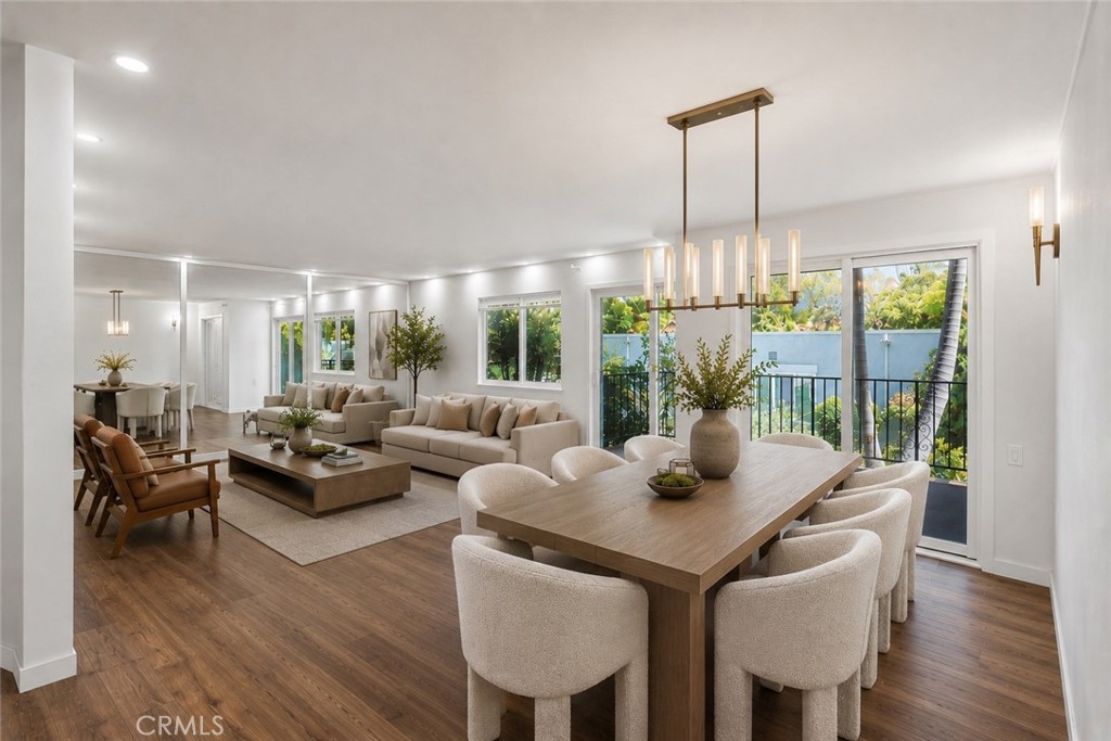 Open concept living room and dining AI enhanced - 2354 Via Mariposa W 1E, Laguna Woods CA 92637 - photo 1