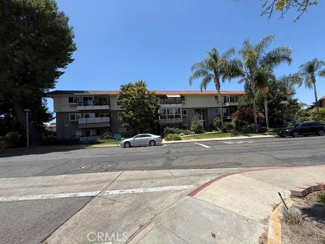 Building front view - 2393 #1F Via Mariposa W, Laguna Woods CA 92637 - photo 1