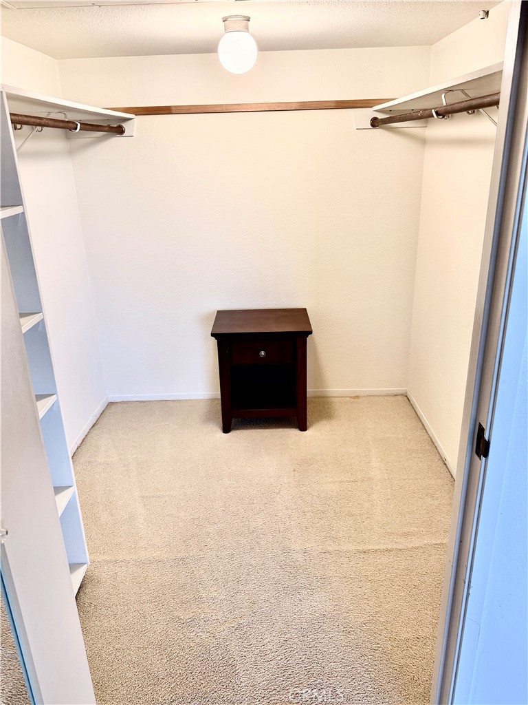 Walk-in Closet - 24055 Paseo Del Lago, Laguna Woods CA 92637 - photo 9