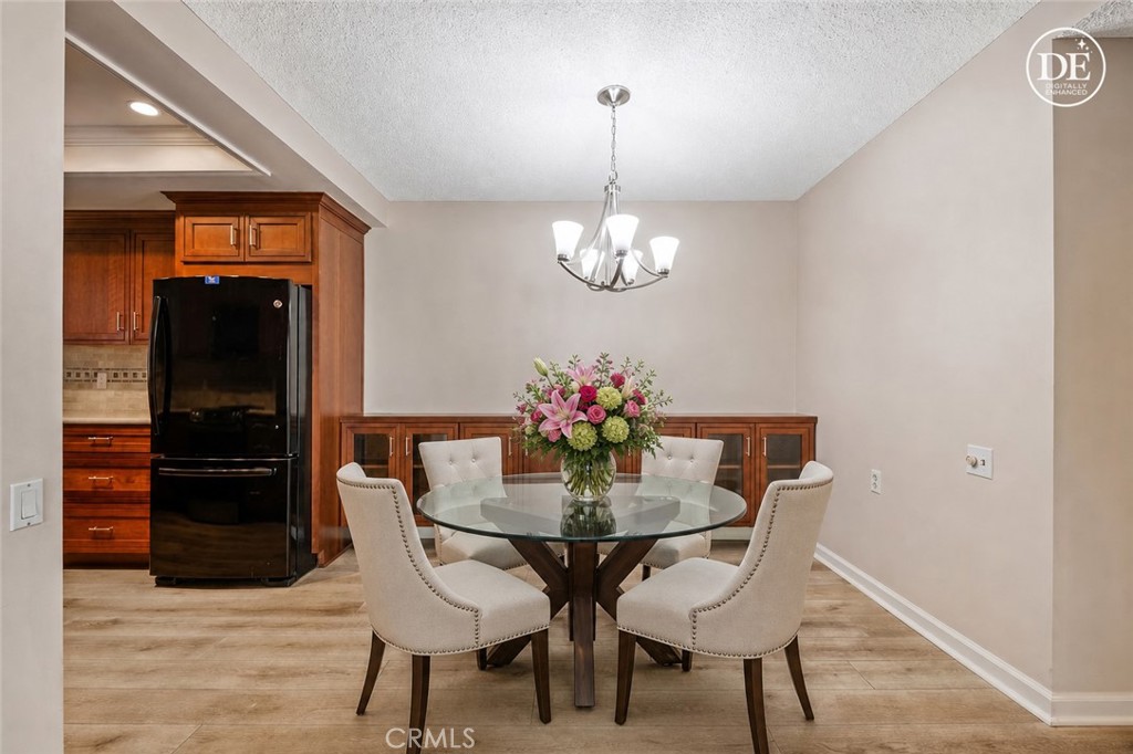 Dining Room virtually staged - 270 Avenida Sevilla D, Laguna Woods CA 92637 - photo 9