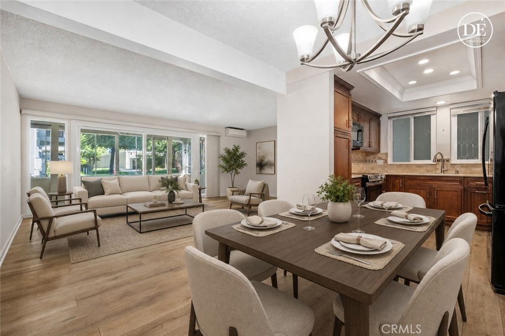 Virtually Staged Living and Dining Room - 270 Avenida Sevilla D, Laguna Woods CA 92637 - photo 11