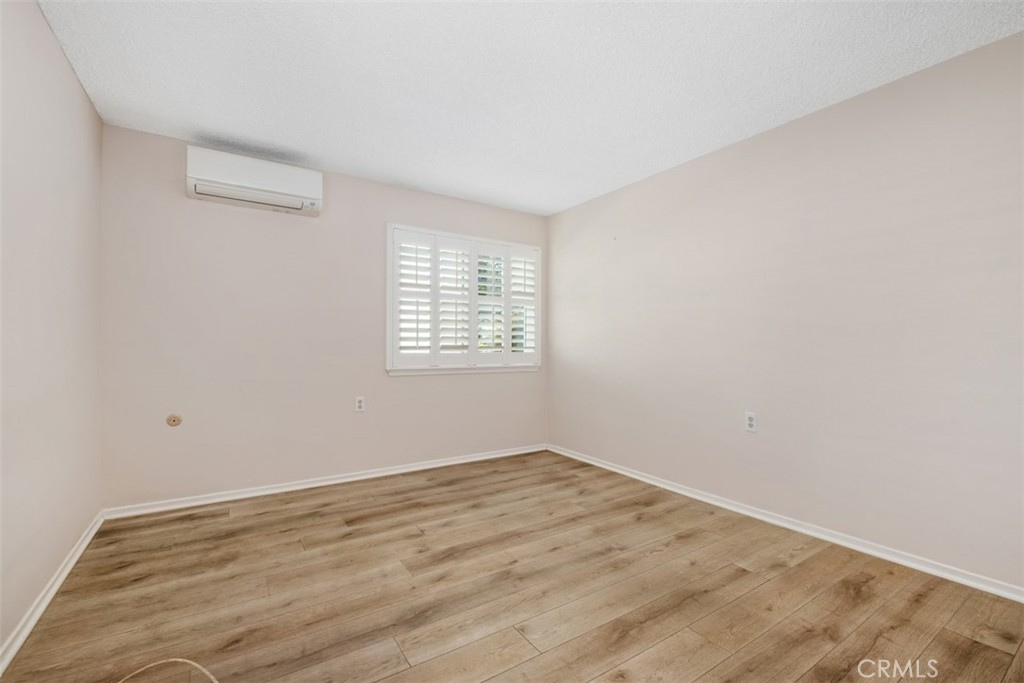 Primary bedroom with 2 windows - 270 Avenida Sevilla D, Laguna Woods CA 92637 - photo 26