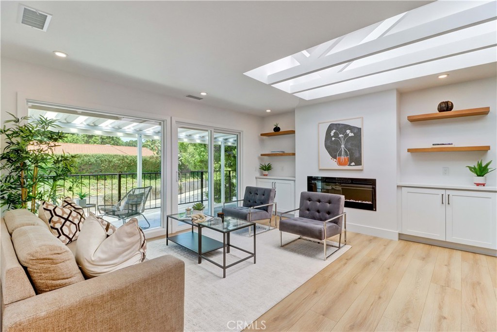 Living Room Skylight over Exposed Ceiling Beams - 3021 Via Buena Vista O, Laguna Woods CA 92637 - photo 1