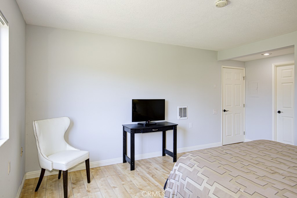 Property is unfurnished - furniture is for staging purposes only. - 3280 San Amadeo S A, Laguna Woods CA 92637 - photo 26
