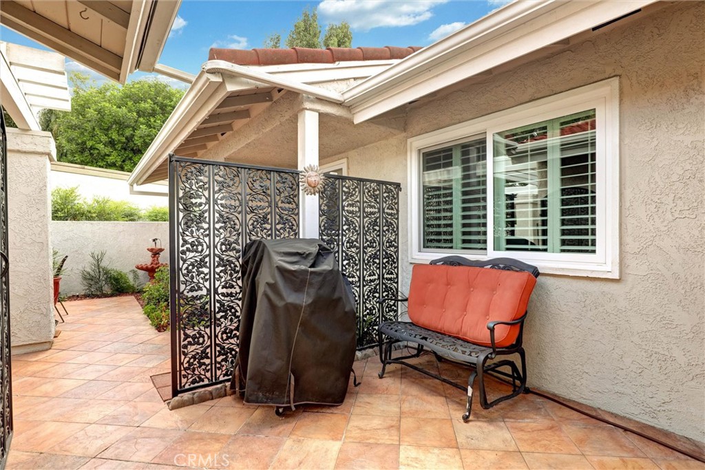 Additional patio off the bonus room and garage - 3400 Punta Alta A, Laguna Woods CA 92637 - photo 6