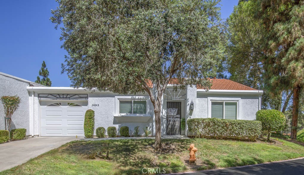 Welcome to 3424-B Calle Azul - an upgraded two-bedroom, two-bath, single-level MALAGA residence in the active Laguna Woo - 3424 Calle Azul B, Laguna Woods CA 92637 - photo 1