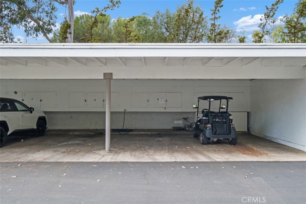 Carport Area with storage cabinets within easy distance from Condo - 3501 Bahia Blanca W 3F, Laguna Woods CA 92637 - photo 29