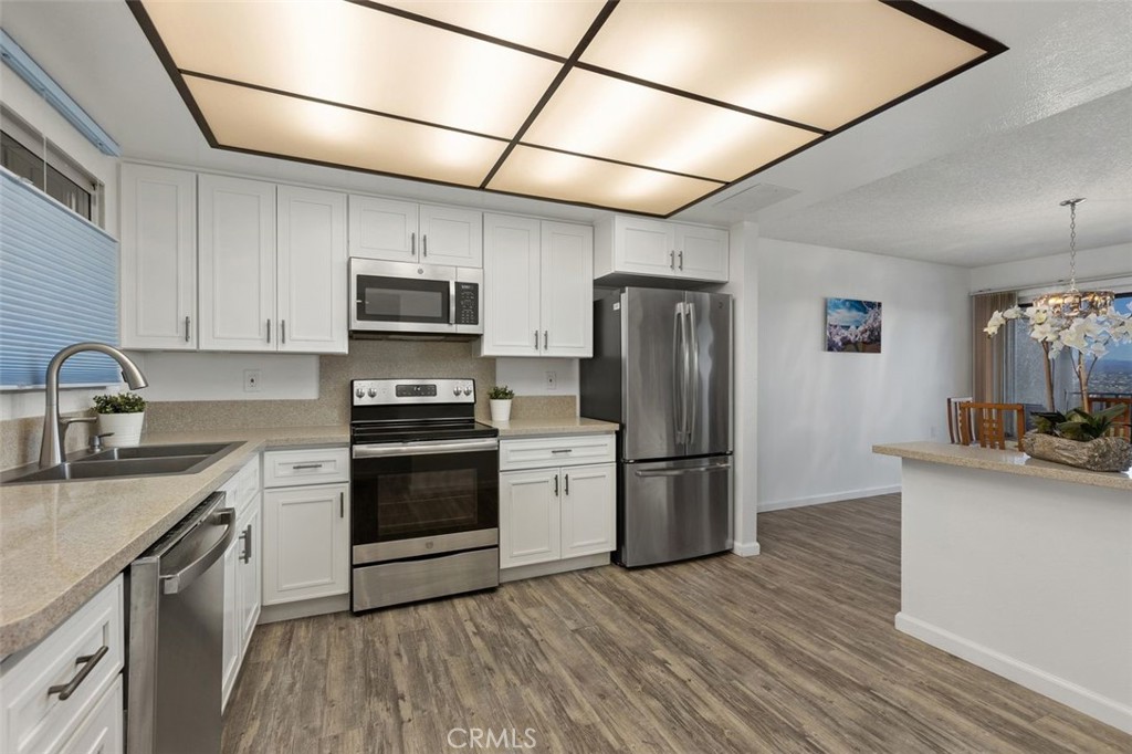 Open kitchen with room for a dinette! - 4013 Calle Sonora Oeste Unit 2E, Laguna Woods CA 92637 - photo 14