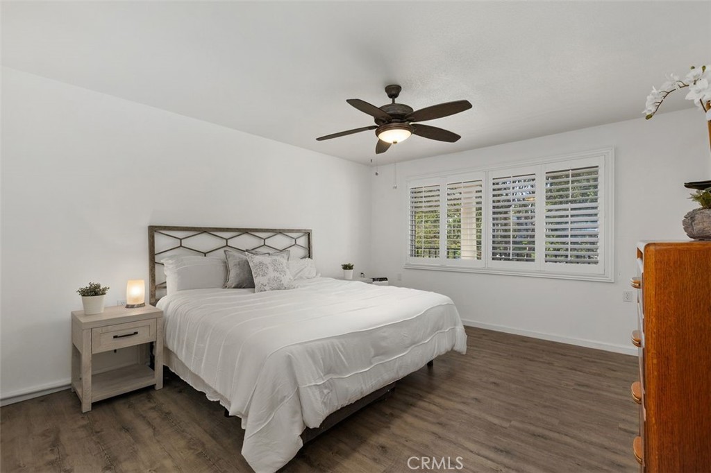 Spacious Primary Suite with lovely view of trees and garden. - 4013 Calle Sonora Oeste Unit 2E, Laguna Woods CA 92637 - photo 26