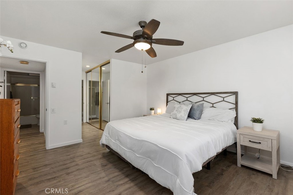 Primary Suite features mirrored wardrobe. - 4013 Calle Sonora Oeste Unit 2E, Laguna Woods CA 92637 - photo 28