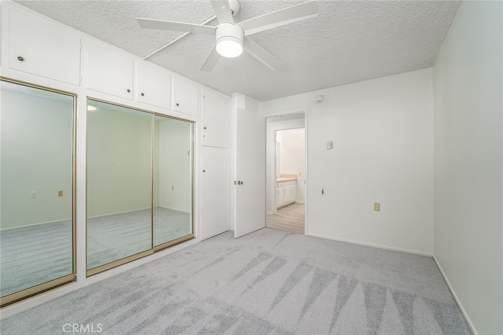 Ceiling fan with light - 476 Calle Cadiz O, Laguna Woods CA 92637 - photo 14
