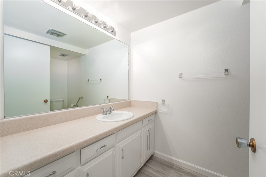 Guest bath in hallway - 476 Calle Cadiz O, Laguna Woods CA 92637 - photo 15