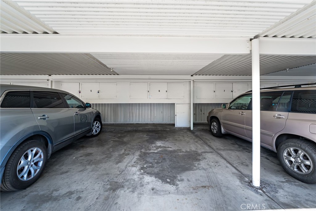Carport with storage - 476 Calle Cadiz O, Laguna Woods CA 92637 - photo 25