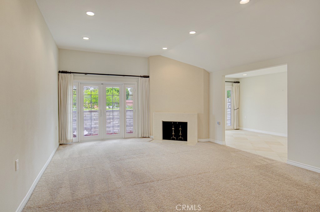 Another view of the living room. Entry to the dining area at right. - 5016 Jardin, Laguna Woods CA 92637 - photo 7