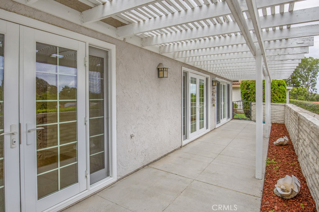 Another view of the rear patio. - 5016 Jardin, Laguna Woods CA 92637 - photo 11