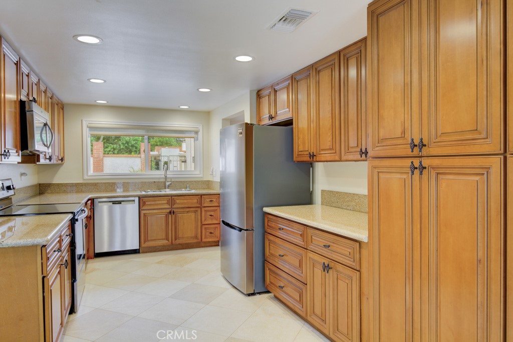 Another view of the kitchen. - 5016 Jardin, Laguna Woods CA 92637 - photo 14