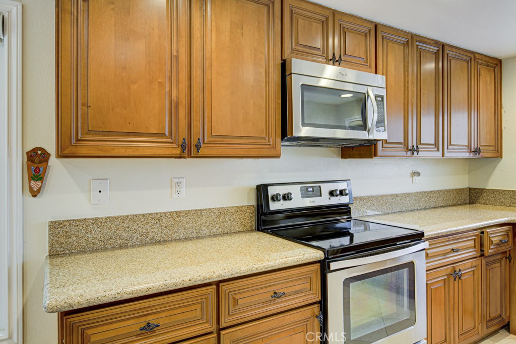 Another view of the kitchen. - 5016 Jardin, Laguna Woods CA 92637 - photo 15