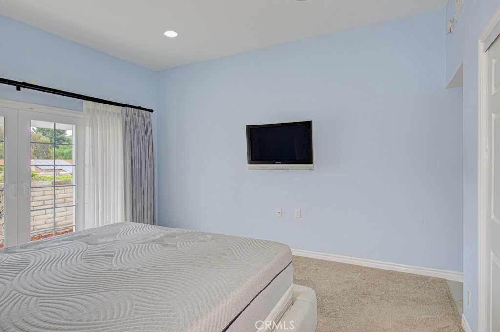 Another view of the primary bedroom. - 5016 Jardin, Laguna Woods CA 92637 - photo 20