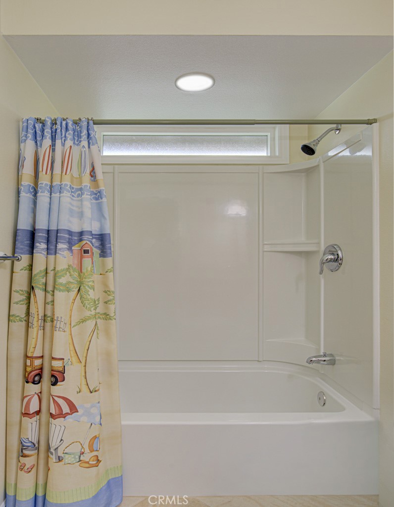 Tub/shower combo in guest bathroom #1. - 5016 Jardin, Laguna Woods CA 92637 - photo 27