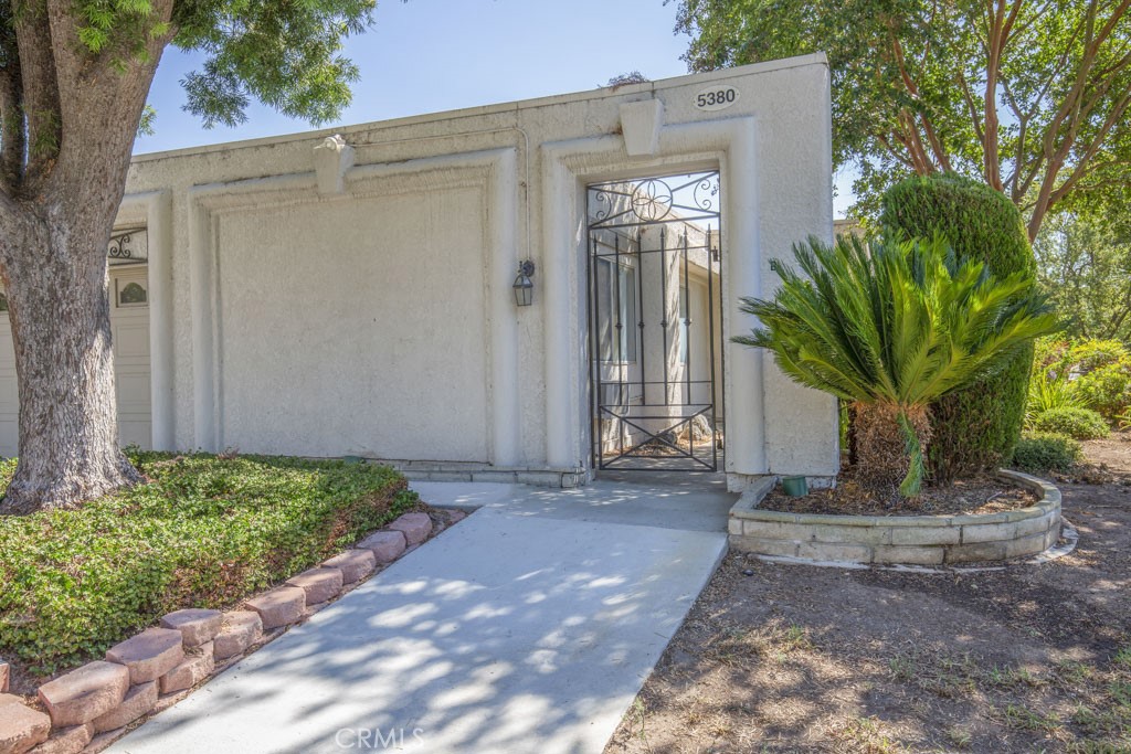 Another view of the front of the property and the entry gate. - 5380 Avenida Sosiega B, Laguna Woods CA 92637 - photo 2
