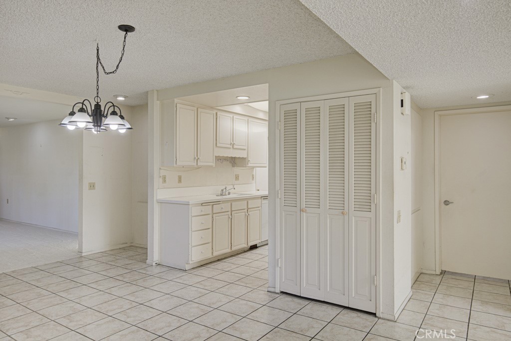 Dining area and entry to the kitchen. - 5380 Avenida Sosiega B, Laguna Woods CA 92637 - photo 7