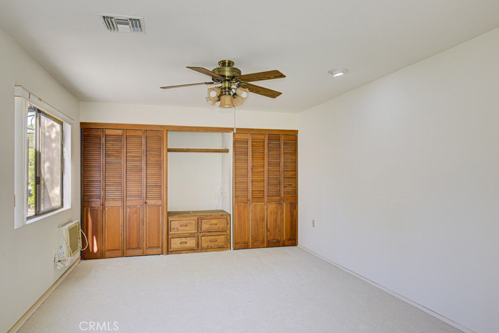 Fully-finished bonus room extension just off the dining area adds about 250 sq. ft. of living space to the residence. Th - 5380 Avenida Sosiega B, Laguna Woods CA 92637 - photo 13
