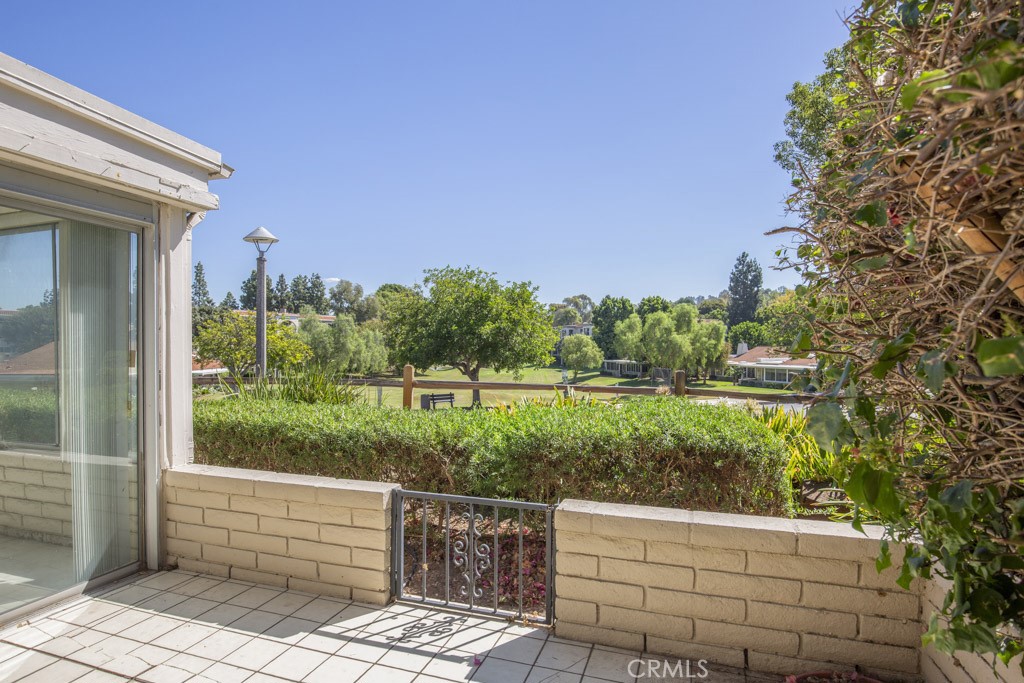 Open rear patio is perfect for outdoor entertaining, dining and relaxing. - 5380 Avenida Sosiega B, Laguna Woods CA 92637 - photo 28