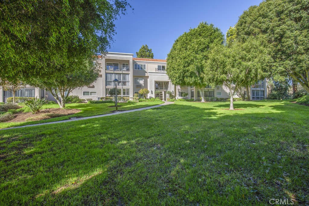 Welcome to 5499-2D Paseo Del Lago West - a two-bedroom, two-bath, end-unit EL MIRADOR residence located at the second le - 5499 Paseo Del Lago W 2D, Laguna Woods CA 92637 - photo 1