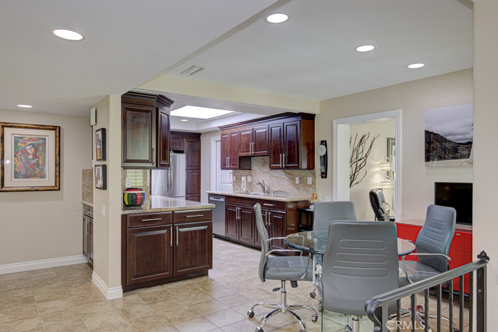 Dining area and kitchen. - 5516 Paseo Del Lago W A, Laguna Woods CA 92637 - photo 7