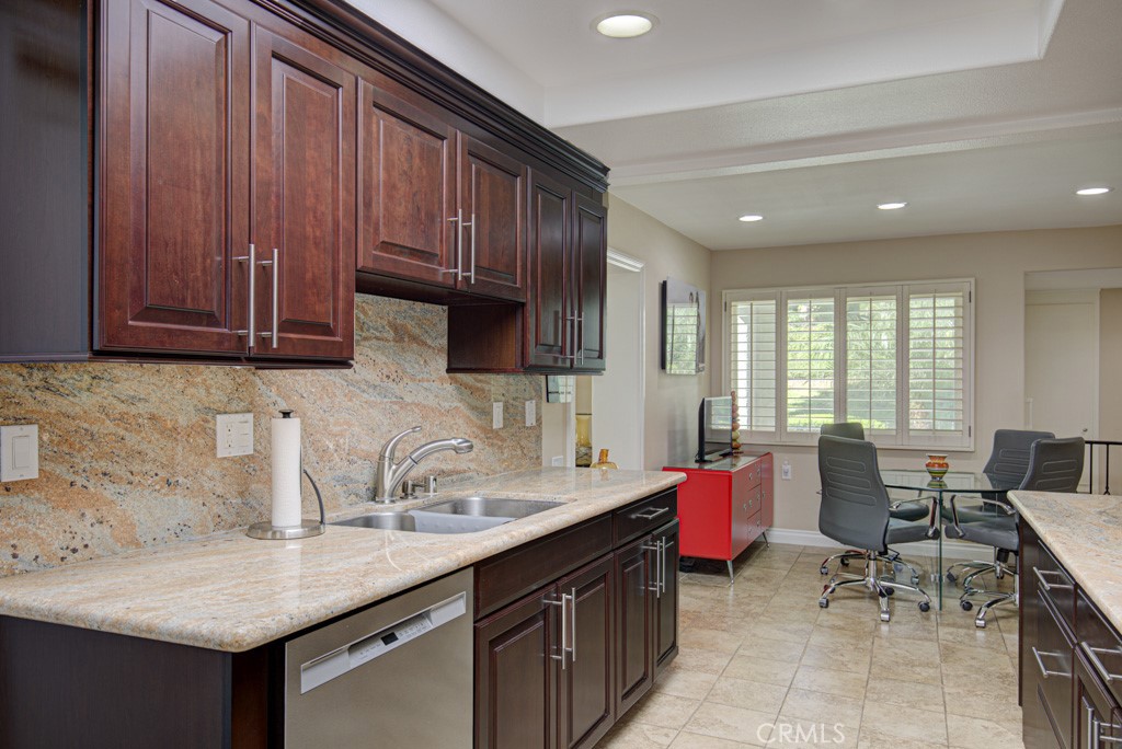 Another view of the kitchen looking towards the dining area. - 5516 Paseo Del Lago W A, Laguna Woods CA 92637 - photo 10