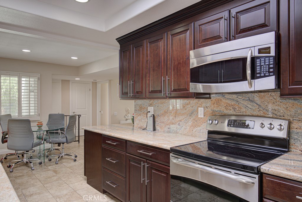 Another view of the kitchen. - 5516 Paseo Del Lago W A, Laguna Woods CA 92637 - photo 11