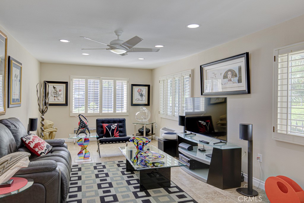 Enormous multi-purpose bonus room extension adds approximately 300 square feet of living space. This versatile space cou - 5516 Paseo Del Lago W A, Laguna Woods CA 92637 - photo 12