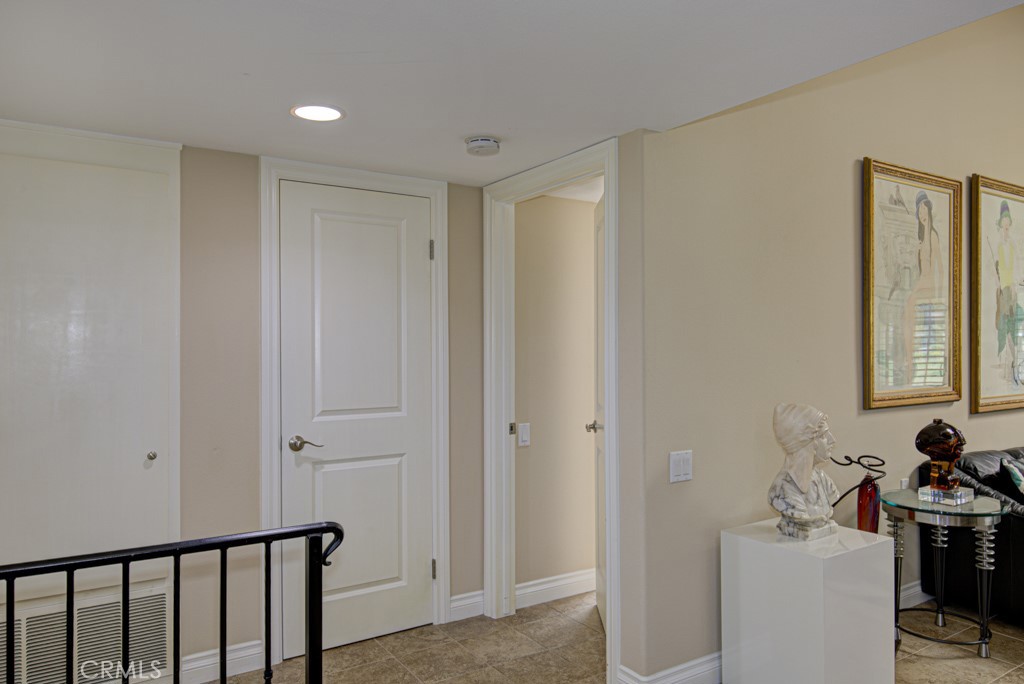 Entry to left-side bedroom suite. - 5516 Paseo Del Lago W A, Laguna Woods CA 92637 - photo 20