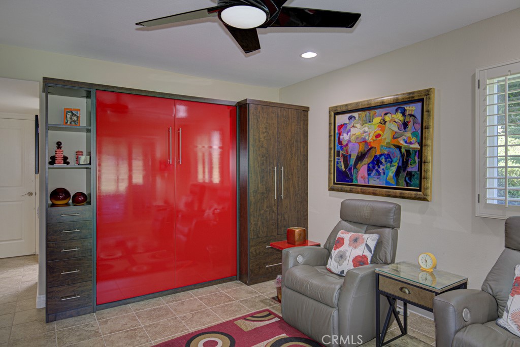 Left-side bedroom suite has a built-in Murphy bed. - 5516 Paseo Del Lago W A, Laguna Woods CA 92637 - photo 22