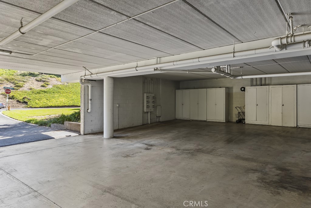 Covered parking w/ storage and elevator access - 5517 Paseo Del Lago E 1E, Laguna Woods CA 92637 - photo 75