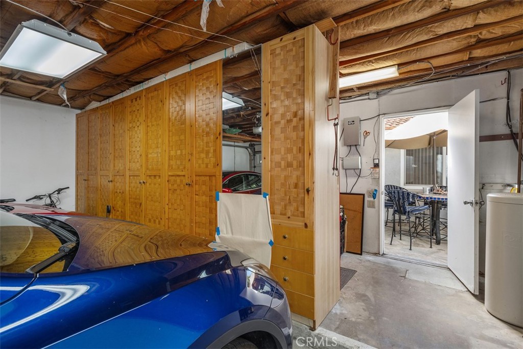 EXCESSIVE STORAGE IN GARAGE WITH PULL OUT SHELVING - 5522 Via La Mesa B, Laguna Woods CA 92637 - photo 39