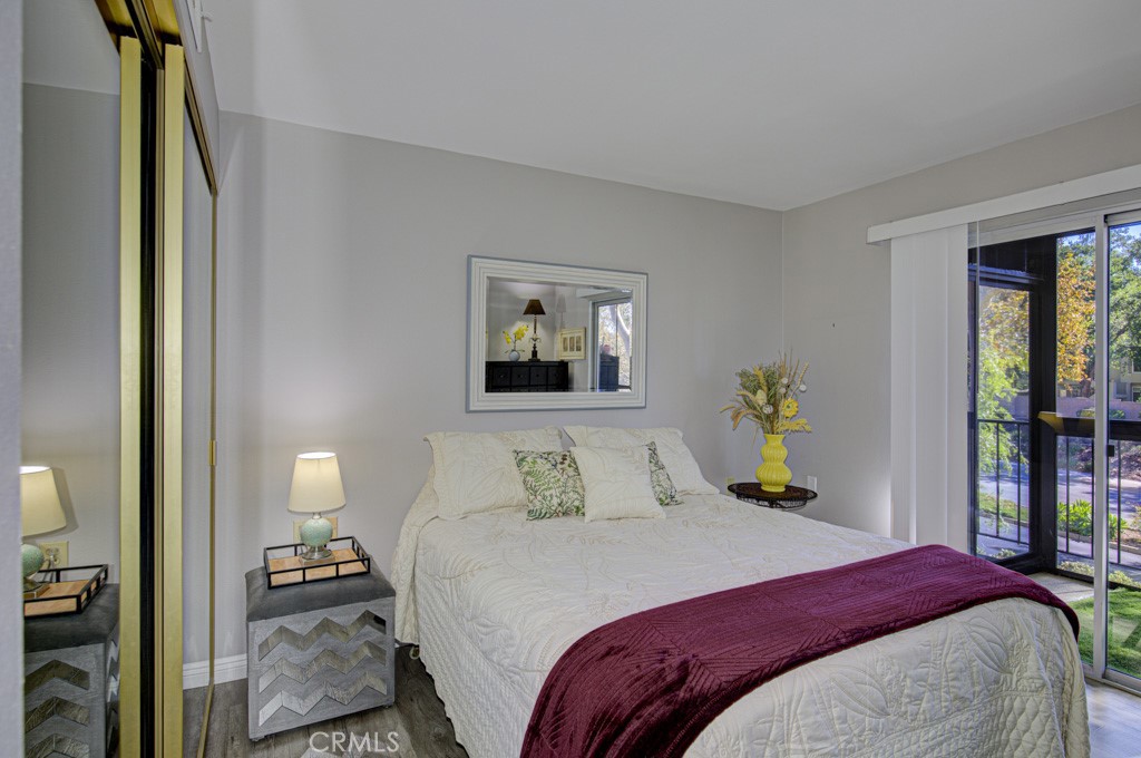 Guest Bedroom with slider to enclosed patio area - 5531 Via La Mesa O, Laguna Woods CA 92637 - photo 12