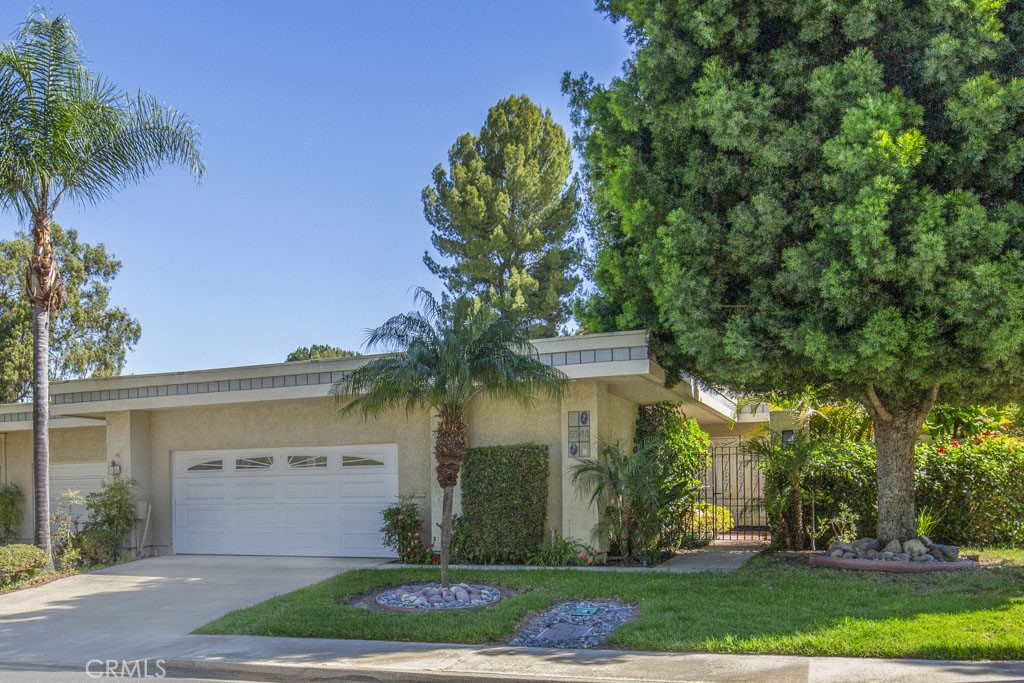 Welcome to 5544-B Rayo Del Sol - an elegant remodeled three-bedroom, two-bath, single-level CASA LORENZO residence in th - 5544 Rayo Del Sol B, Laguna Woods CA 92637 - photo 1