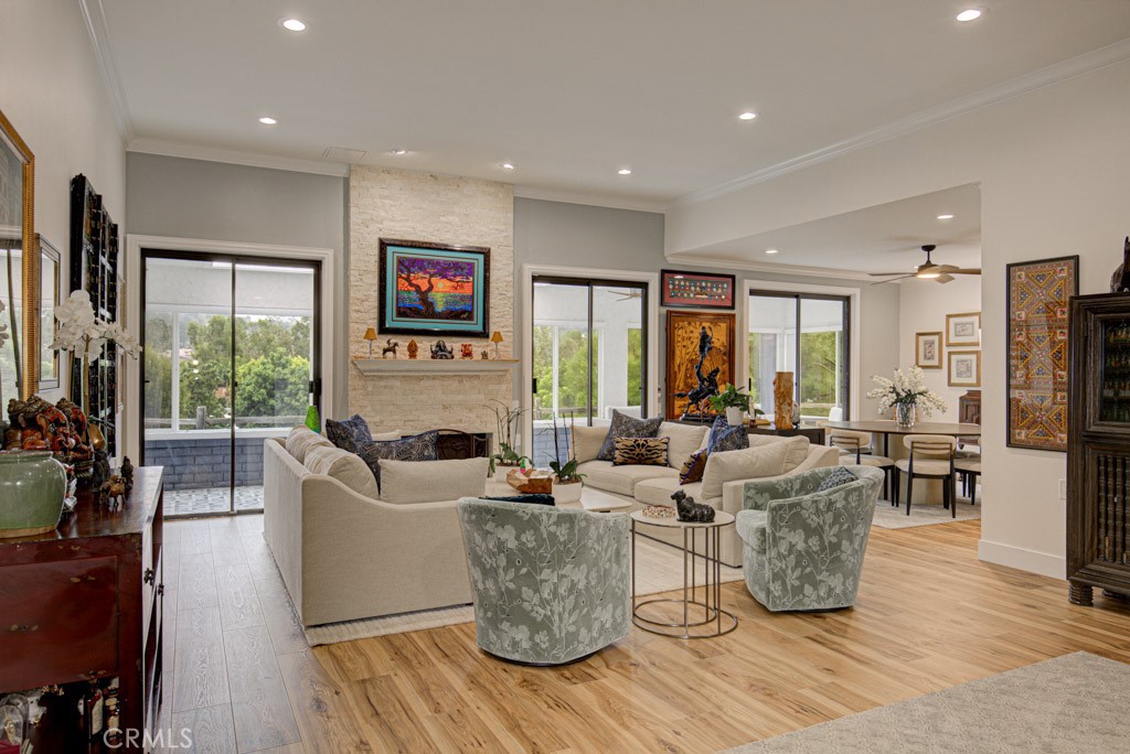 Another view of the living room. Dining room can be seen at right rear. - 5553 Rayo Del Sol B, Laguna Woods CA 92637 - photo 7