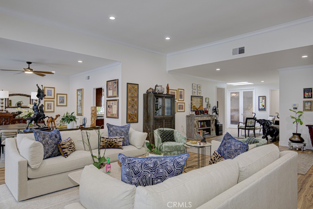 Another view of the living room. Dining room at far left. - 5553 Rayo Del Sol B, Laguna Woods CA 92637 - photo 10